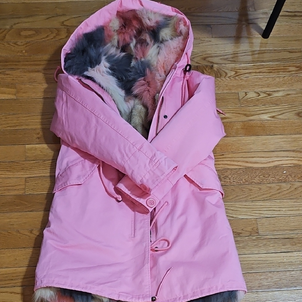 A Pink Puffer Jacket with Real Fox Fur